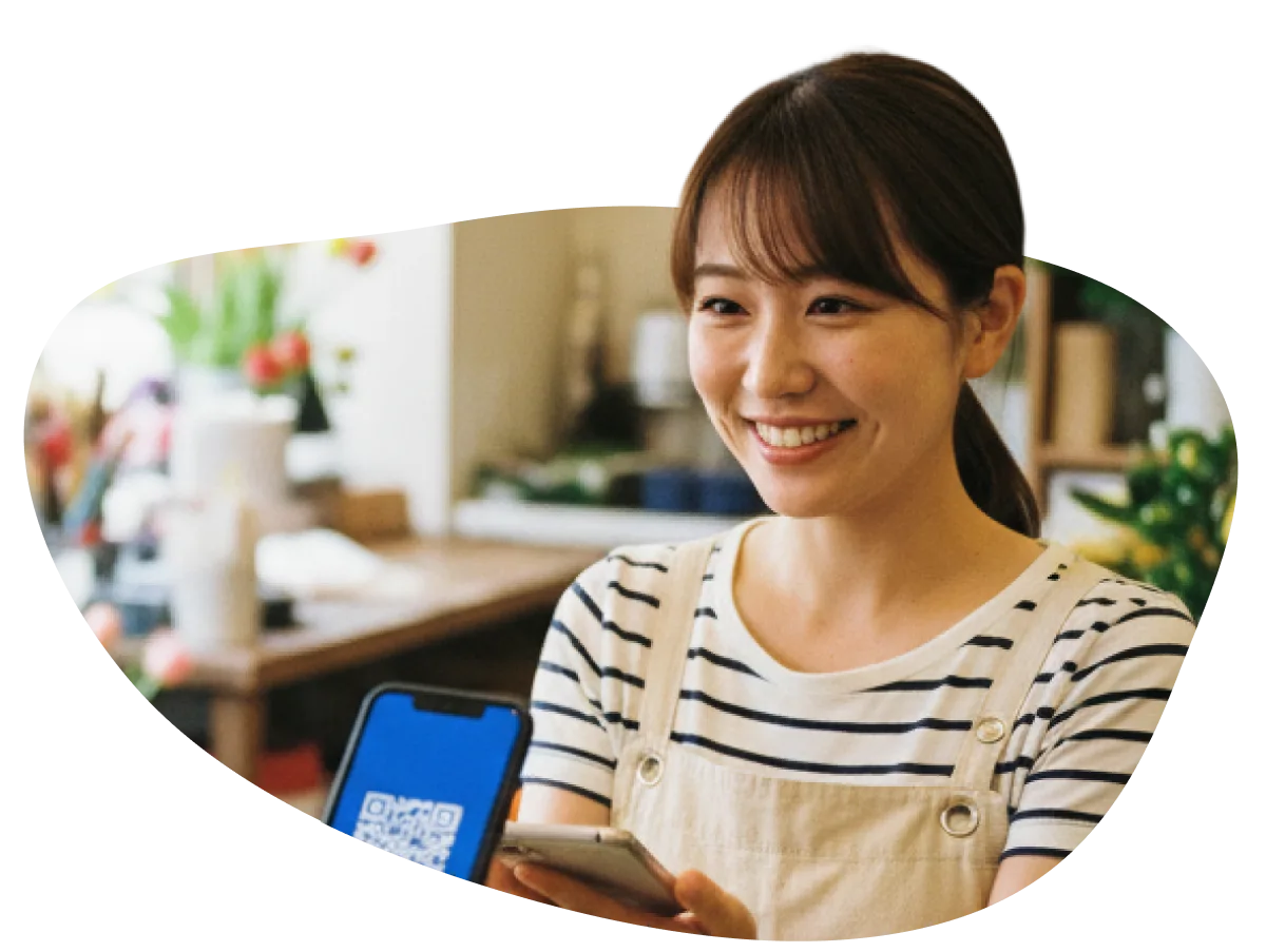 花屋スタッフがcoupoでクーポンを確認する様子